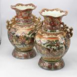 A pair of large modern Chinese satsuma vases, each having a flared rim to a baluster body, decorated