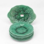 A collection of seven Victorian green glazed Staffordshire strawberry dishes