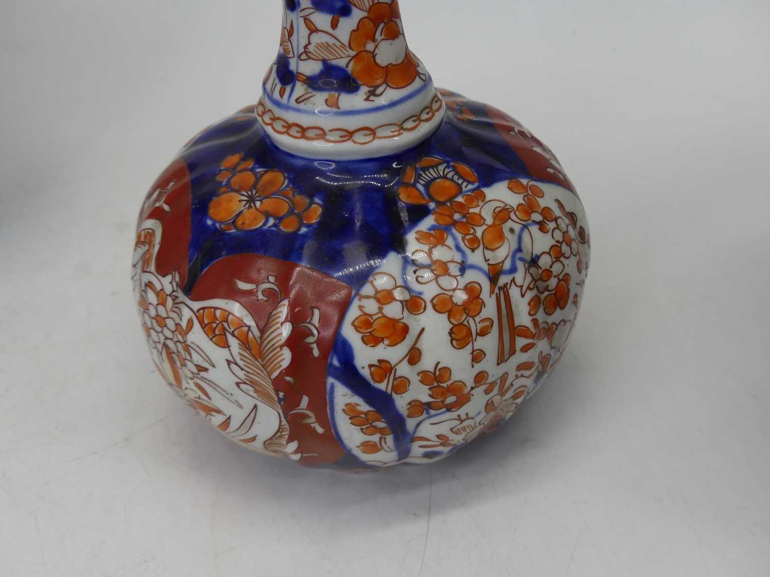 A pair of Japanese Imari bottle vases, each having a slender tapering neck to a compressed melon - Image 4 of 5