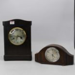 A 1930s oak cased mantel clock having a silvered dial with Arabic numerals and eight day movement,
