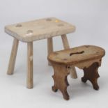 A 19th century provincial elm candle-stand / small stool, the oval top above a shaped apron and on