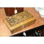 A George IV penwork work box, of sarcophagus form, the hinged lid with scrolling flowers and