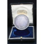 An Edwardian cast white metal medal for the National Chrysanthemum Society in fitted box and with