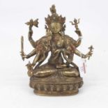 A modern bronze alloy model of an eastern deity in seated lotus pose, height 22cm