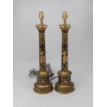 A pair of modern Chinese cloisonne type table candlesticks, each decorated in the Chinese style with