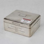 A mid-20th century silver table cigarette box, with presentation inscription and dated 1961, marks