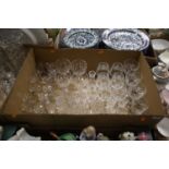 A collection of cut glass drinking glasses