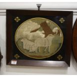 A 19th century woolwork panel embroidered as sheep in landscape housed in a rosewood frame,