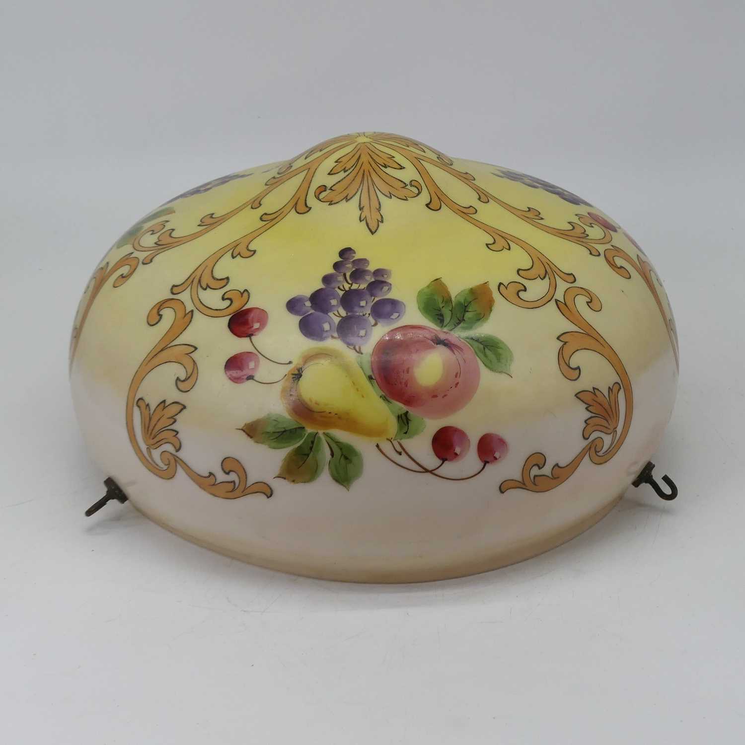 A large early 20th century opalescent glass ceiling light shade, of mushroom shape, hand-painted