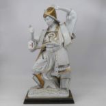 A large Italian Carpie blanc-de-chine and gilt heightened model of a Samurai, in standing pose, on