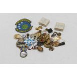 A collection of tokens and medals, to include The St John's Ambulance Association medal awarded to
