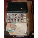 A collection of cigarette cards to include Churchman's, Player's cycling etc