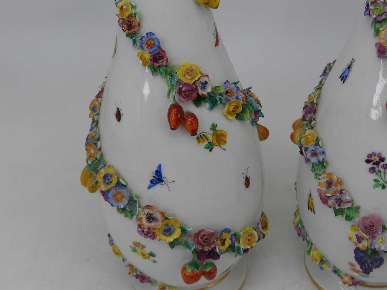 A pair of early 20th century Dresden porcelain vases, each of teardrop shape with applied floral - Image 2 of 3