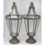 A pair of modern outside hanging lanterns each of tapering hexagonal form, height 70cm