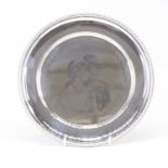 A Queen Elizabeth II silver wedding anniversary commemorative silver plate, stamped 925, cased