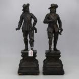 A pair of early 20th century spelter figures, modelled as Charles I and Oliver Cromwell, in standing