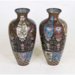 A pair of Chinese cloisonne enamel decorated vases, h.21cm (a/f)