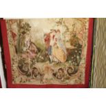 A large Continental needlework tapestry wall hanging, depicting figures in an ornate garden, in
