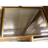 A reproduction gilt framed and bevelled rectangular wall mirror, of good size, 112 x 140cmGlass to