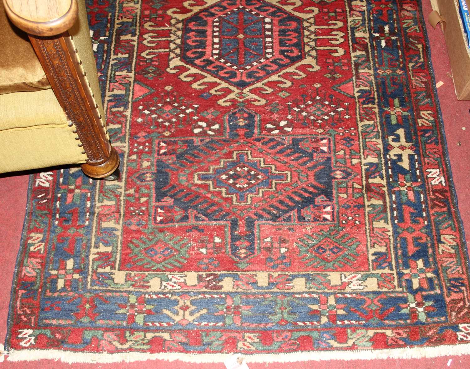 A Persian woollen red ground Shiraz hall runner, the geometric lozenge central ground within - Image 2 of 3