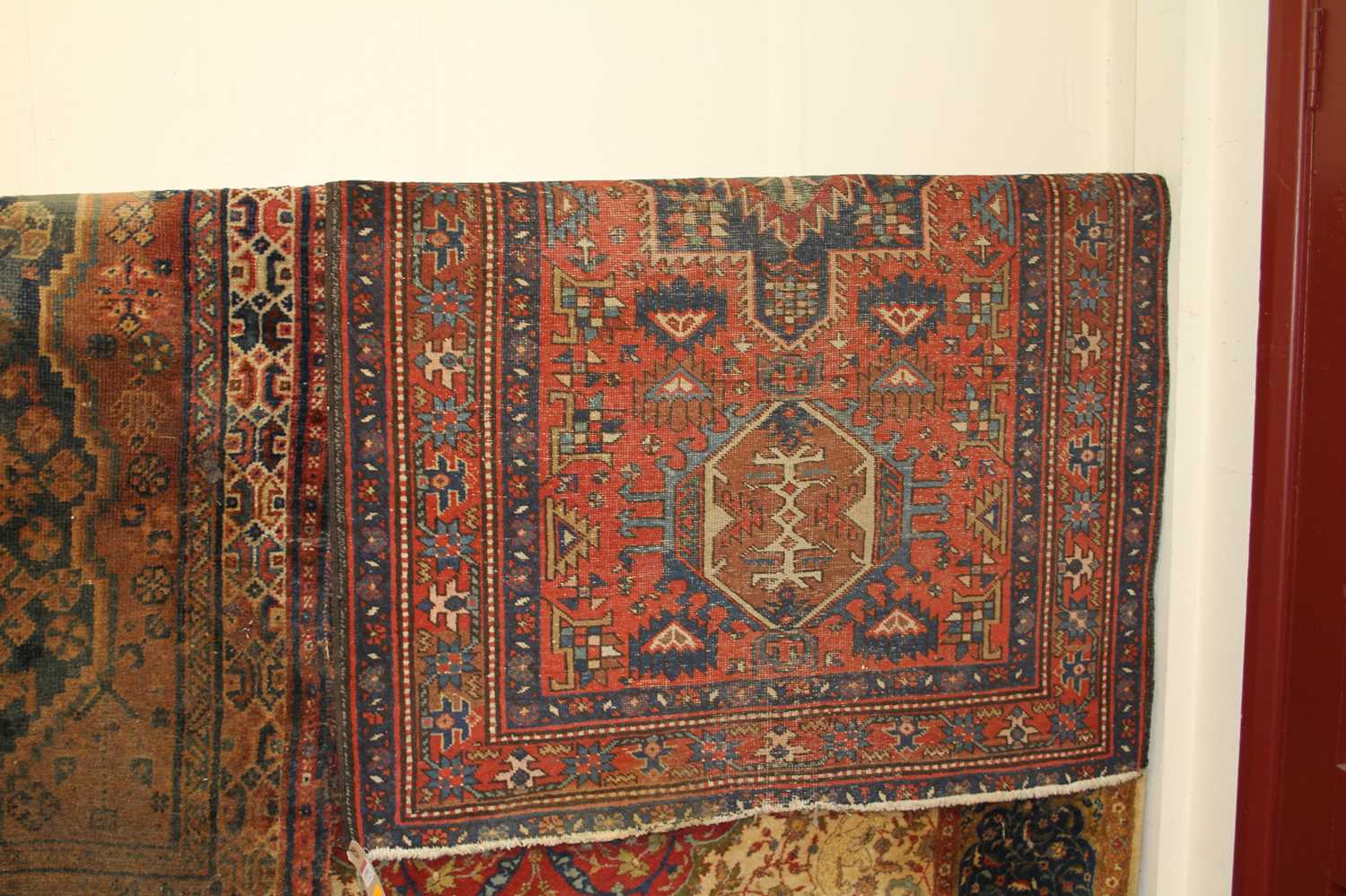 A Persian woollen red ground Shiraz rug 145 x 100cm, together with one other (2) - Image 3 of 3