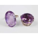 A yellow metal amethyst pendant and ring set, the pendant comprising a round faceted amethyst in a