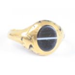 A yellow metal Victorian banded agate memorial ring, the banded agate measuring approx 9.1 x 7.