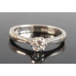 A platinum diamond solitaire ring, comprising a round brilliant cut diamond in claw setting, diamond