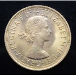 Great Britain, 1965 gold full sovereign, Elizabeth II, rev: St George and Dragon above date. (1)