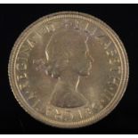 Great Britain, 1965 gold full sovereign, Elizabeth II, rev: St George and Dragon above date. (1)