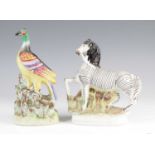 A Victorian Staffordshire model of a zebra, shown in standing pose, h.22cm, together with a