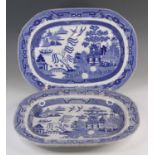 A matched pair of Staffordshire blue and white transfer decorated meat plates, 19th century, each