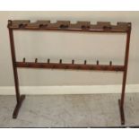 An unusual 19th century mahogany freestanding two-tier shoe rack, h.83cm, length 93cm