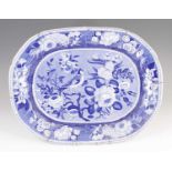 A Staffordshire blue and white transfer decorated meat dish, circa 1820, in the 'Goldfinch' pattern,