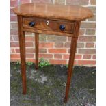 A Regency mahogany cross banded and further ebony strung single drawer side table, raised on