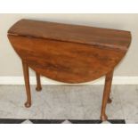 An 18th century provincial yew wood dropleaf table, the oval fall leaves with opposing gateleg