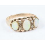 A 9ct rose gold, opal and diamond half hoop eternity ring, comprising three graduated oval opal