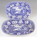 A graduated set of two John and Richard Riley blue and white transfer decorated meat plates, circa