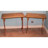 A near-pair of Victorian light oak round cornered side tables, raised on end cut supports, each h.