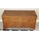 An 18th century elm hinge topped blanket chest, of plain form, raised on bracket supports, h.55cm,