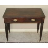A 19th century mahogany two drawer side table, raised on reeded tapering supports to brass