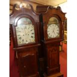 Two early 19th century provincial oak and mahogany cross banded long case clocks, each having