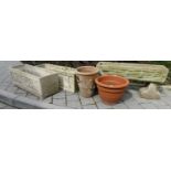 Three various reconstituted stone rectangular garden trough planters, together with two terracotta