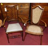 Two Edwardian mahogany elbow chairs, each with pad seats