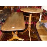 A 19th century fruitwood circular pedestal tripod occasional table, together with a reproduction