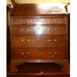 A 19th century mahogany slopefront writing bureau, having a fitted interior over four long graduated