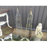 A pair of wired metal garden obelisks, each height 156cm