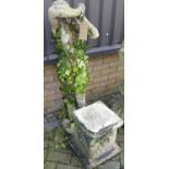 A reconstituted stone garden figure of a standing classical maiden, height 115cm, together with a