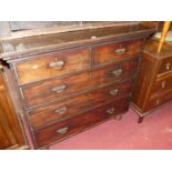 A 19th century mahogany square front chest, of two short over three long drawers, raised on