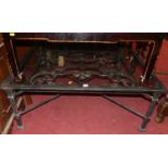 A large contemporary silvered wrought iron square coffee table, having heavy glass plate top, with